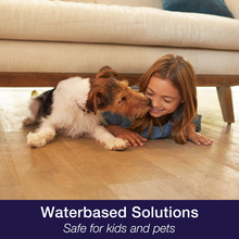 Dog and child play under the sofa on wood floor