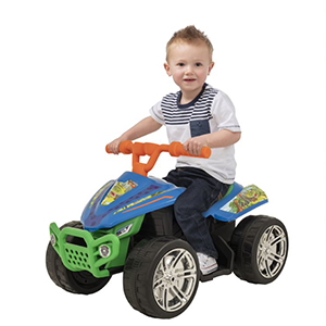 Little Boy riding Dinosaur Quad Bike