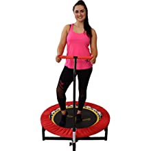smiling young lady standing on boogie bounce trampoline