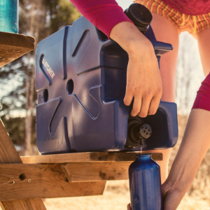 Pouring purified water from a LifeSaver Jerrycan