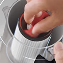 Image shows hand using the rotation clean device