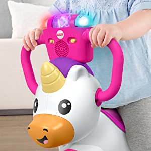 â€‹Fisher-Price Bounce and Spin Unicorn - UK English Edition, musical ride-on baby toy