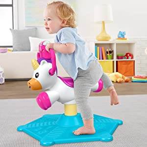 â€‹Fisher-Price Bounce and Spin Unicorn - UK English Edition, musical ride-on baby toy