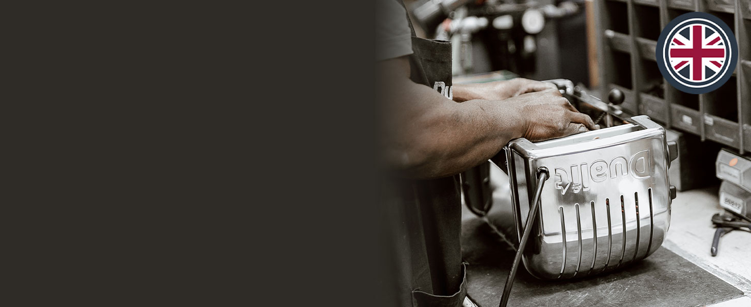 Made in the UK - a man assembles a toaster in a factory.