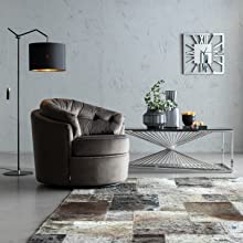 Armchair, floor lamp, carpet, sideboard 