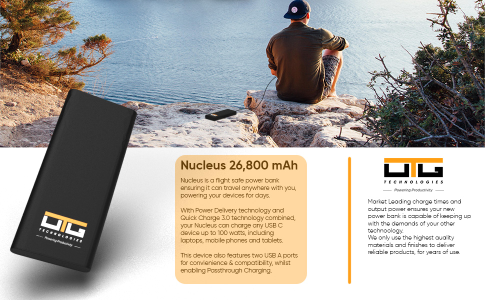 An image of a man using the Nucleus power bank, looking over a sunny harbor. The ultimate power bank