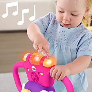 â€‹Fisher-Price Bounce and Spin Unicorn - UK English Edition, musical ride-on baby toy