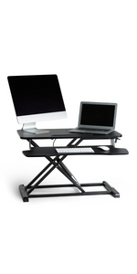 Standing desk converter with keyboard riser