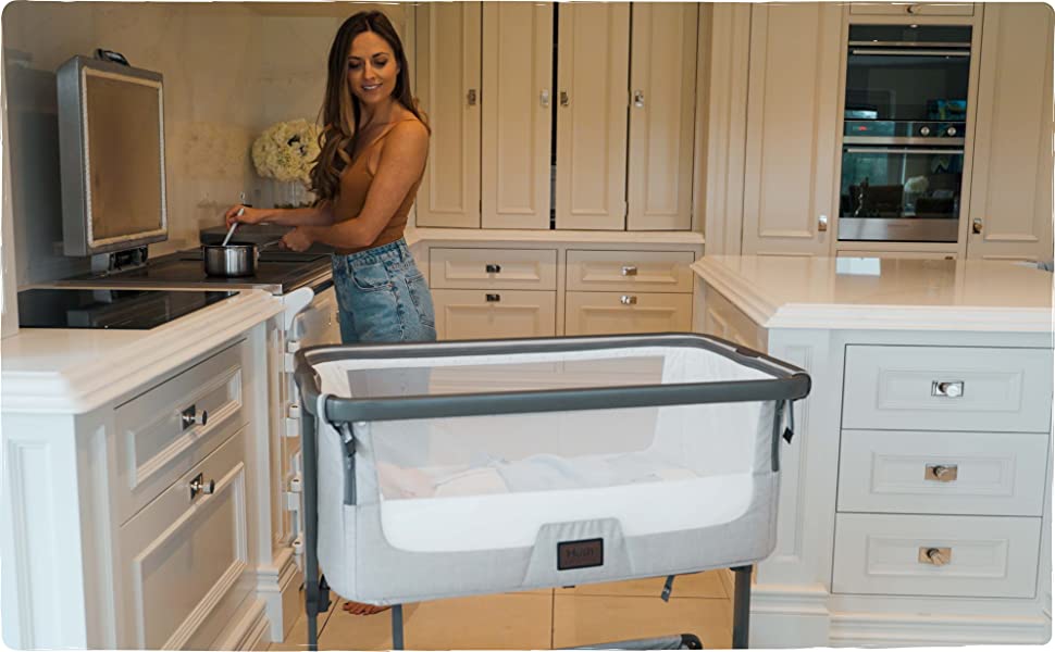 Height adjustable sides that can be used to reduce colic and reflux