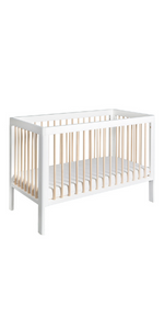 troll lukas cot in white for babies nursery with wooden poles in a Scandinavian design stylish