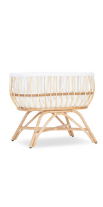 Aria crib with liner and mattress included. The cutest rattan addition for your newborn baby