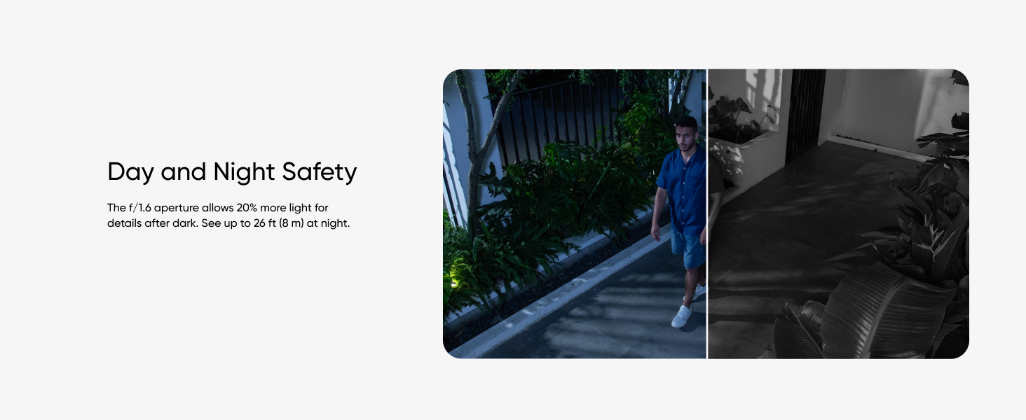 a man walking down a sidewalk with a camera on the left side.