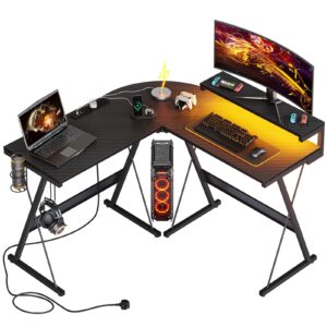Bestier L Shaped Gaming Desk Computer Desk with LED Lights Monitor Stand 130CM Corner Desk with Cup Holder Headset Hook Ergonomic for Home Office Small Space (Carbon Fiber Black (With Outlet)