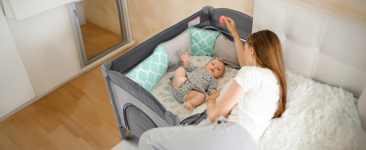 travel cot with mattress included