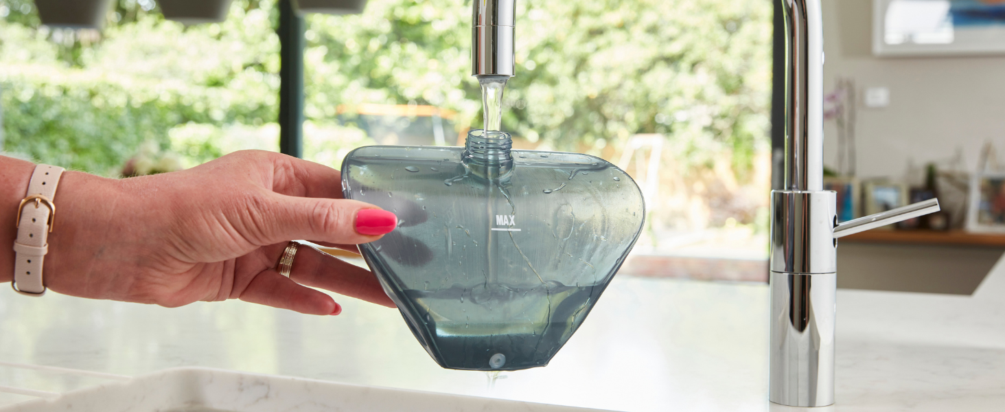 Water tank handheld carpet cleaner