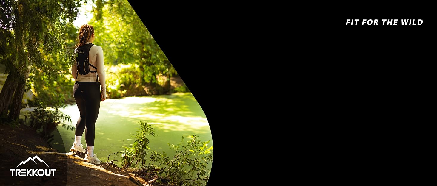 A hiker on a nature trail, highlighting the Trekkout brand's focus on outdoor fitness.