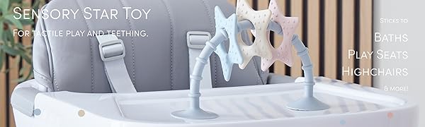 Shnuggle Stick N Play Baby Teether on a Highchair