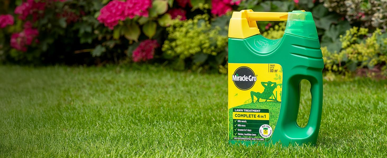 Miracle-Gro Complete 4 in 1 Spreader on a lawn