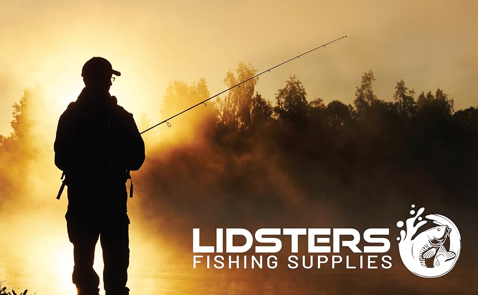 A silhouette of a man stands fishing, the background is a misty sunset over a body of water