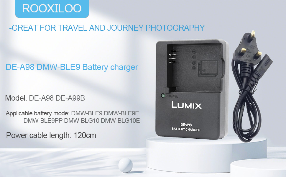 Text reads 'PEDAALOO' and shows battery charger product details. Black Lumix camera battery charger with power cord on gray background.