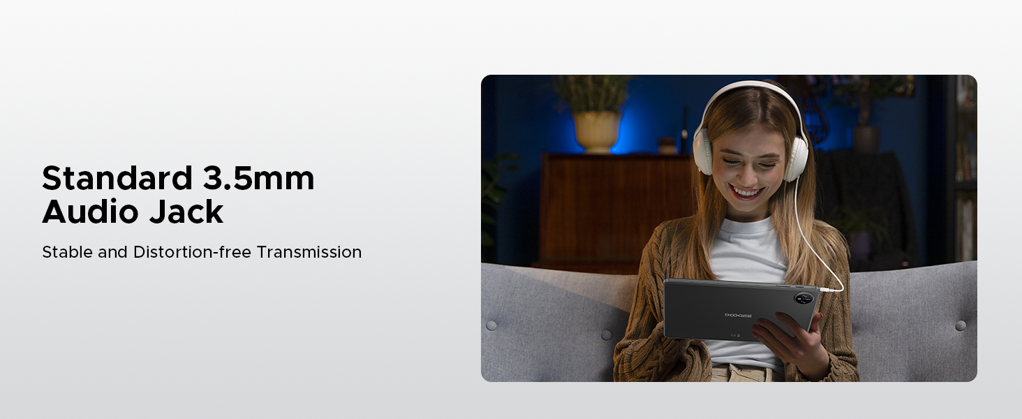 Standard 3.5mm audio jack interface demonstration showing headphone usage in entertainment context.