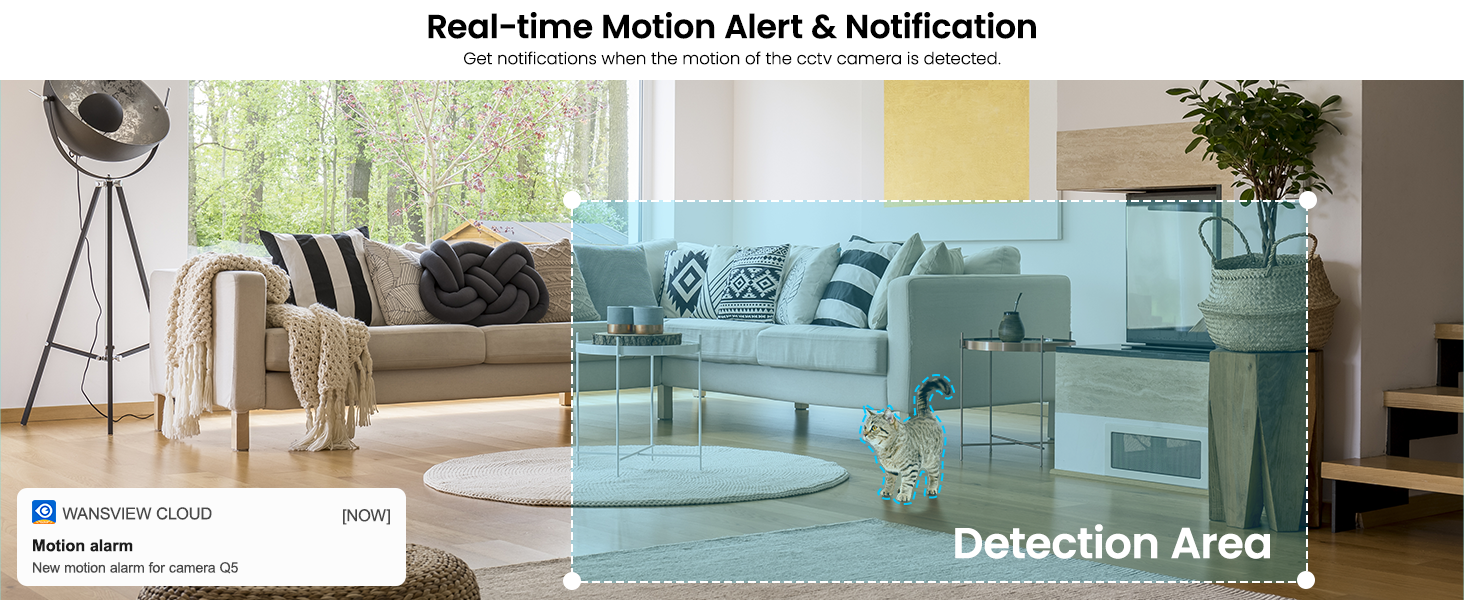 a white couch with a blue blanket on top of it.