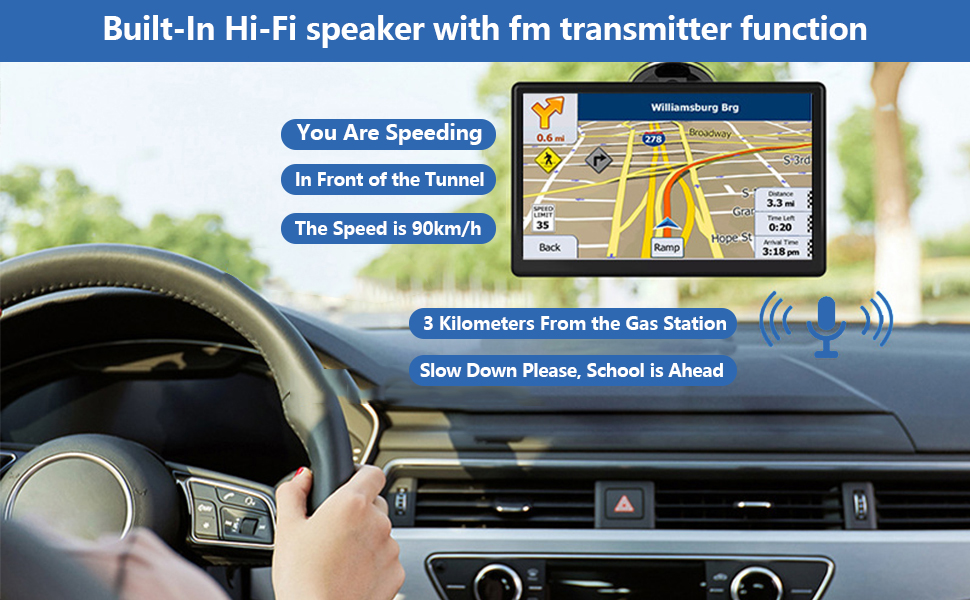 GPS navigation device mounted on car dashboard, displaying map and driving instructions. Device features built-in speaker and FM transmitter. Image shows car interior and driver's hands on steering wheel.
