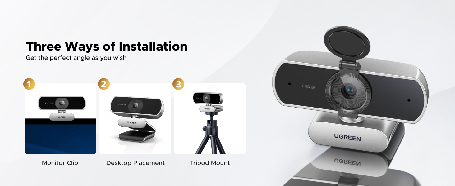 Webcam mounting system showing three installation options: monitor clip, desktop placement, and tripod mount. Includes white webcam with adjustable base.