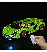 Model Formula 1 race car with dramatic blue LED lighting effects against black background, featuring detailed aerodynamic components and green wheel accents.