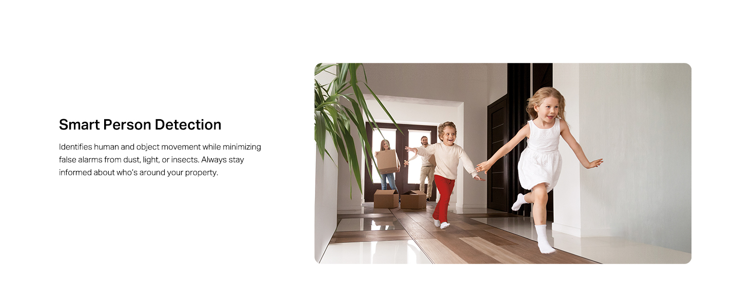 Text reads: 'Smart Person Detection'. Security camera demonstration showing motion tracking and person detection capabilities in indoor setting.