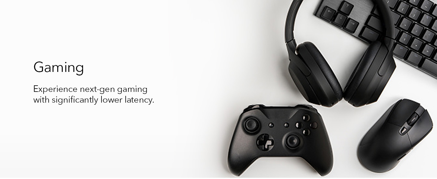 Text reads 'Gaming'. Collection of gaming controllers and accessories displayed against a dark background.