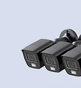 Black handheld device with built-in LED light illuminating a dark area. Device has a curved ergonomic shape and appears to be a portable flashlight or inspection tool.