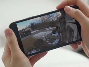a video camera on a tv stand.