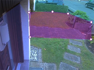 a man using a lawn mower to mow the grass