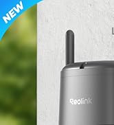 White dome security camera mounted on corner of wooden furniture. Camera has a rotating design for adjustable viewing angles.