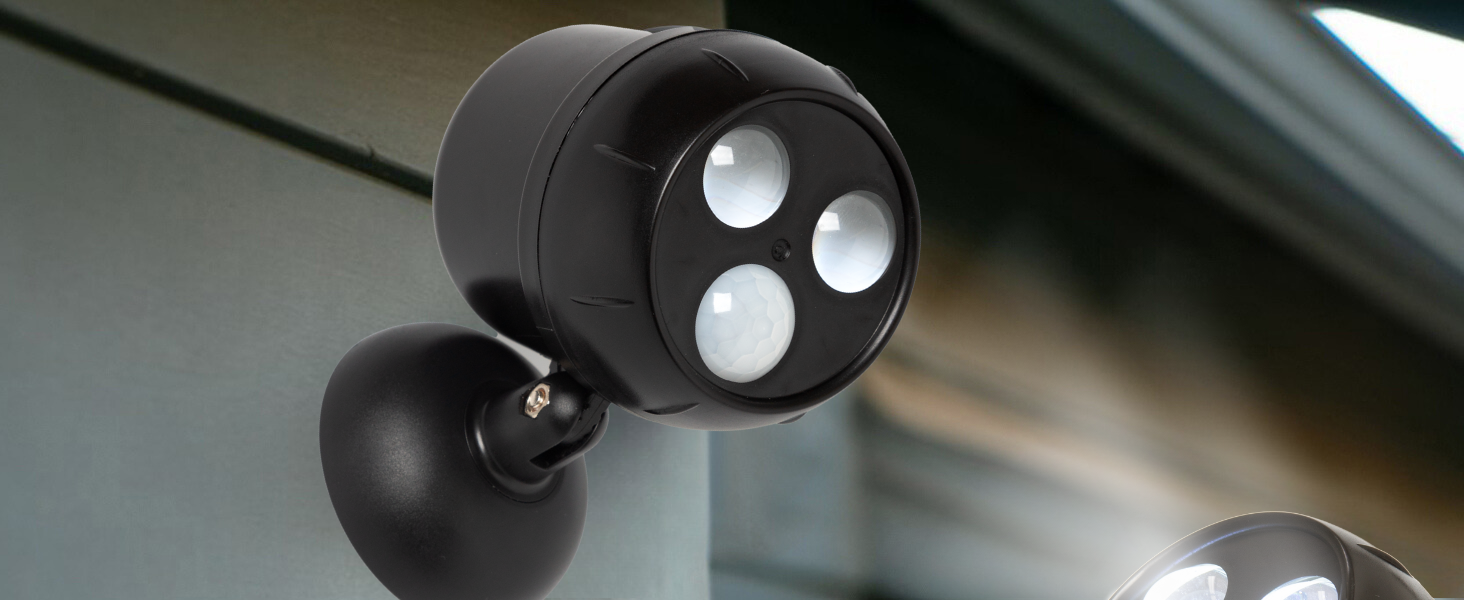 Black adjustable spotlight with three LED bulbs, mounted on what appears to be a car interior, likely for accent lighting.