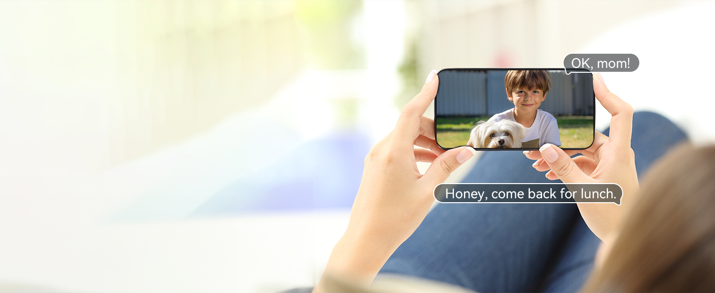 A person holding a smartphone displaying a video call with a young boy. Text bubbles show messages exchanged during the call.