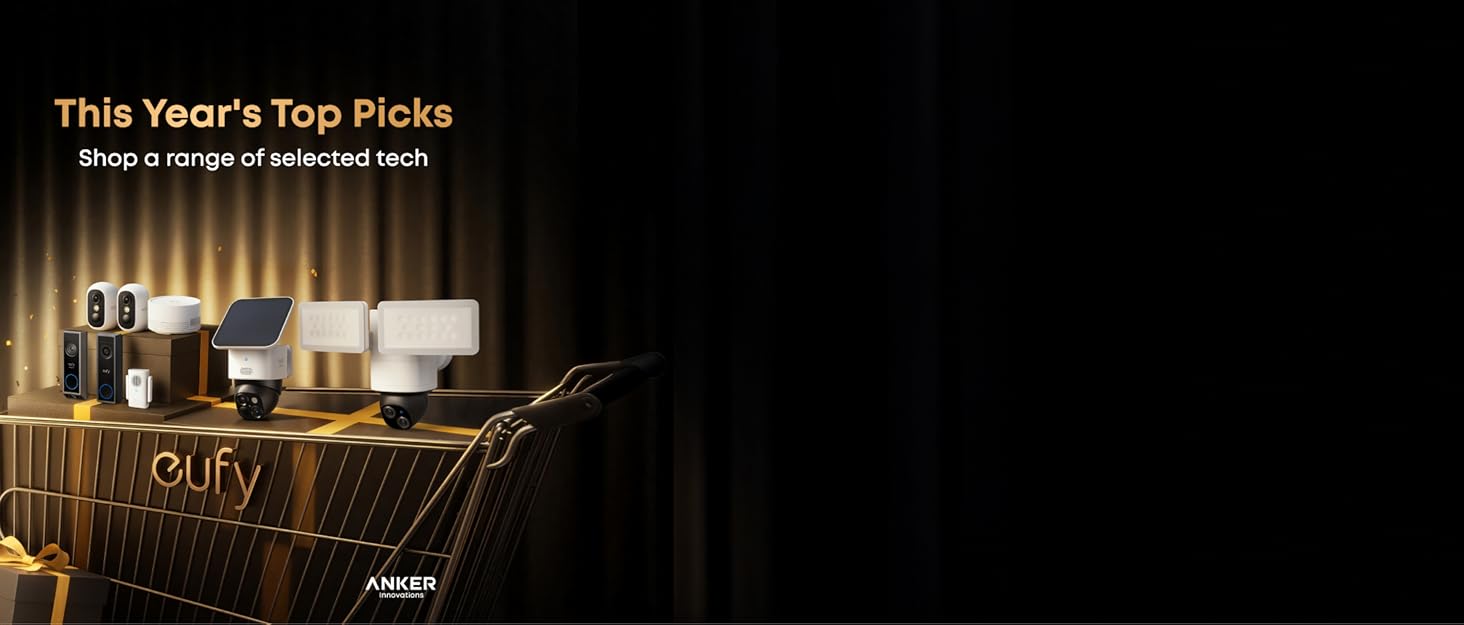 Text reads 'This Year's Top Picks'. Dark atmospheric image showing illuminated interior space with warm lighting.