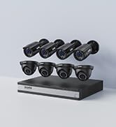 a group of white cameras sitting on top of a counter.