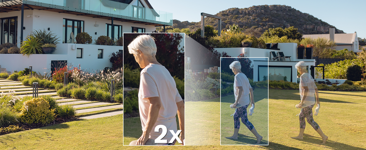 a woman walking in a garden