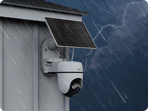 Sequence showing installation of security camera or mounting system on exterior wall corner, photographed at night or in low light.