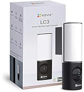 Multiple views of dark cylindrical speakers or audio devices with metallic accents, shown from different angles against a white background.