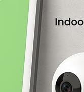 Close-up view of a security or surveillance camera mounted on a ceiling or wall against a dark blue background.