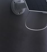 Partial view of a product labeled 'SolarCam' in white text against a dark background with mounting brackets visible.