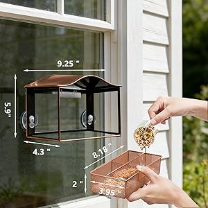 Text reads '1.Removable Seed Tray' and '2.Wavy rain deflector'. Instructional images showing copper-colored bird feeder with removable tray and rain protection features.