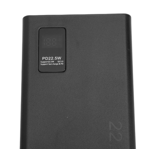 Multiple views of a black square electronic device, showing different angles and ports. Similar to device shown in Image 1.