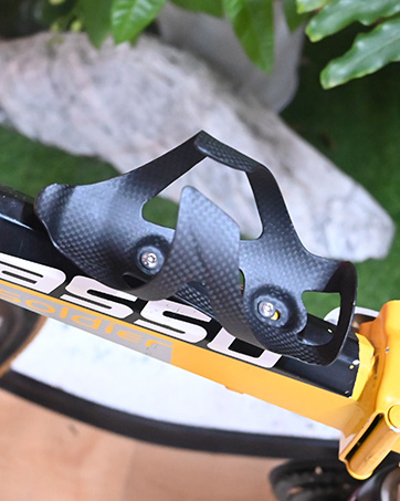 Black and purple bicycle stem with 'WAKE' branding. Features a unique design with multiple cutouts and iridescent bolts. Smaller image shows stem mounted on purple handlebars.