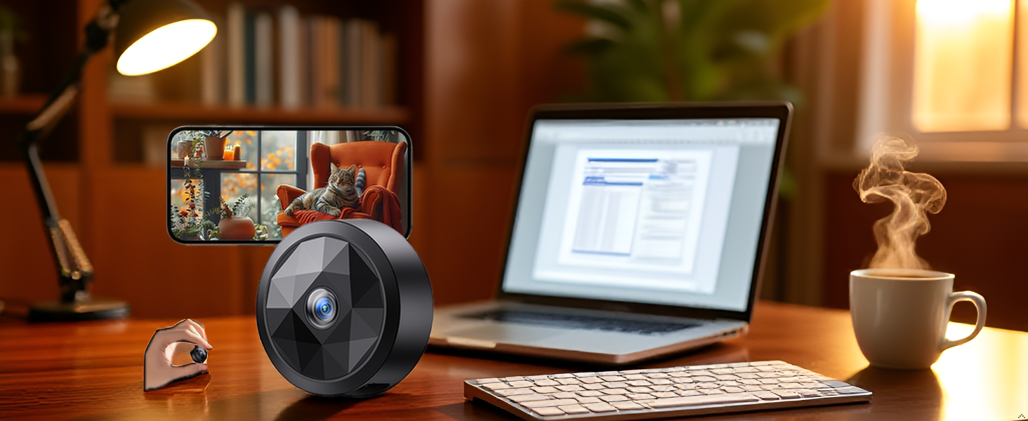Over-ear headphones with black ear cups and headband positioned on wooden desk next to laptop, desk lamp, small framed photos, and potted plant in home office setting.