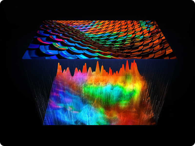 Thermal imaging visualization showing heat distribution patterns in orange, yellow, blue, and green colors across layered surfaces against black background.