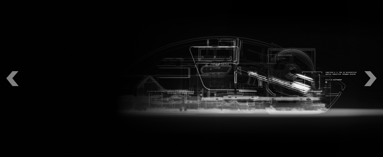 Black and white artistic photograph showing industrial or mechanical equipment in low-key lighting against dark background.